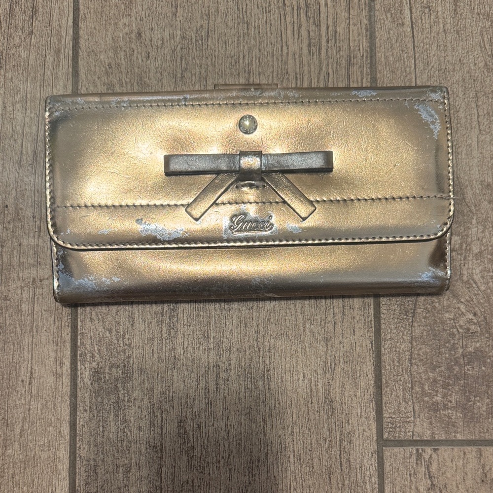 Gucci Metallic Gold Women's Wallet with Bow Accent